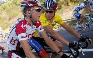 Hamilton (left) with Armstrong in 2003 Credit: New York Times