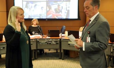 Dr. Crissie Stapleton (left) is sworn in as State Board of Education (SBE) chair by outgoing SBE chair Alan Walters (right) during the December 13, 2022 SBE meeting