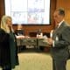 Dr. Crissie Stapleton (left) is sworn in as State Board of Education (SBE) chair by outgoing SBE chair Alan Walters (right) during the December 13, 2022 SBE meeting